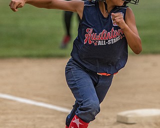 DIANNA OATRIDGE | THE VINDICATOR Fitch's Kali Ray rounds third and heads home to score a run during 10 U state tournament action against Canfield in Tallmadge on Monday. Canfield won 18-4.