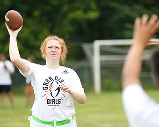Alyssa Ferguson, 17, of Struthers, throws the ball at the Grrridiron Girls Flag Football Camp at Glacier Field in Struthers on Tuesday. EMILY MATTHEWS | THE VINDICATOR