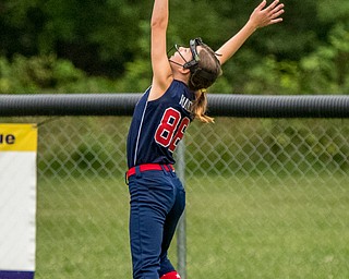 DIANNA OATRIDGE | THE VINDICATOR A deep fly ball gets past the outstretched glove of Austintown's centerfielder Gionna Rucci during the loser's bracket final of the 9-10 Little League state tournament in Tallmadge. Austintown lost 7-3.