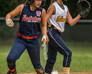 DIANNA OATRIDGE | THE VINDICATOR Austintown's Kylie Folkwein rounds third base during the loser's bracket final of the 9-10 Little League state tournament in Tallmadge. Austintown lost 7-3.