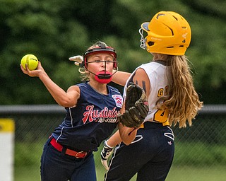 DIANNA OATRIDGE | THE VINDICATOR Austintown's Sam Severn forces out Tallmadge's Allie Gohr at second base and throws to first base for the double play during the loser's bracket final of the 9-10 Little League state tournament in Tallmadge. Austintown lost 7-3.