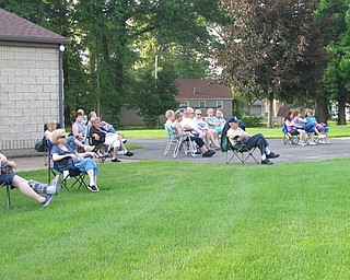 Neighbors | Jessica Harker.A crowd gathered to watch the Jim Frank Combo for the Mill Creek concert series June 28.