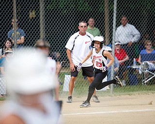 Canfield's Alexis Johnson rounds third during the 10U softball state championship game against Tallmadge at Indian Hills Field on Thursday. Canfield won 5-2. EMILY MATTHEWS | THE VINDICATOR