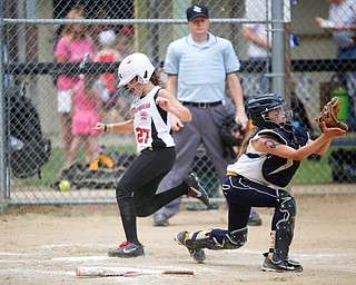 Canfield's Leah Figueroa scores during the 10U softball state championship game against Tallmadge at Indian Hills Field on Thursday. Canfield won 5-2. EMILY MATTHEWS | THE VINDICATOR