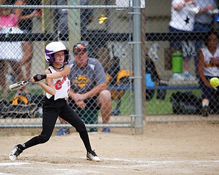 Canfield's Brooke O'Palick gets ready to swing during the 10U softball state championship game against Tallmadge at Indian Hills Field on Thursday. Canfield won 5-2. EMILY MATTHEWS | THE VINDICATOR