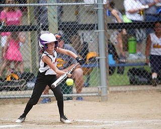 Canfield's Brooke O'Palick bunts during the 10U softball state championship game against Tallmadge at Indian Hills Field on Thursday. Canfield won 5-2. EMILY MATTHEWS | THE VINDICATOR