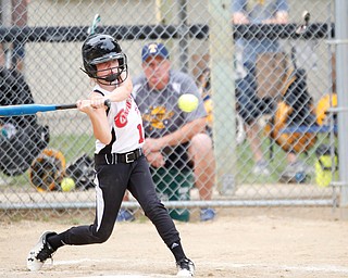 Canfield's Ava Milligan gets ready to swing during the 10U softball state championship game against Tallmadge at Indian Hills Field on Thursday. Canfield won 5-2. EMILY MATTHEWS | THE VINDICATOR