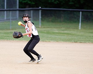 Canfield's Marina Koenig throws the ball to first during the 10U softball state championship game against Tallmadge at Indian Hills Field on Thursday. Canfield won 5-2. EMILY MATTHEWS | THE VINDICATOR