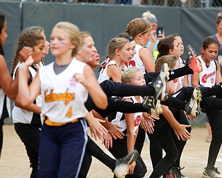 Canfield cheers and congratulates runners-up Tallmadge after winning the 10U softball state championship game at Indian Hills Field on Thursday. EMILY MATTHEWS | THE VINDICATOR