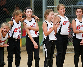 Canfield lines up after winning the 10U softball state championship game against Tallmadge at Indian Hills Field on Thursday. EMILY MATTHEWS | THE VINDICATOR