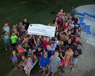 Neighbors | Submitted.The Canfield Swim Club swim team had its seventh annual Swim-A-Thon on July 19. All donations raised by the team members were donated locally to the Showers Family Center For Childhood Cancer at Akron Children’s Hospital in Boardman.