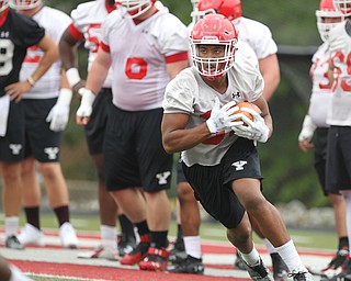 Youngstown state running back Tevin McCaster (37) carries the ball during practice at Stambaugh Stadium on Friday morning.  Dustin Livesay  |  The Vindicator  8/3/18  YSU