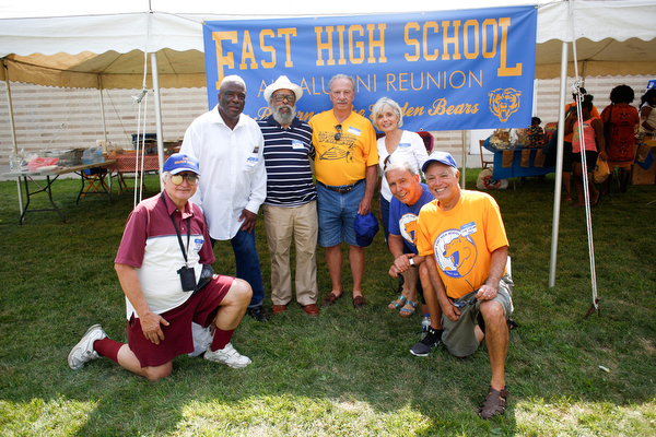 From left, Frank Polofka, Al Jackson, Ed McElroy, Nick DePinto, Margi Napoli, A.J. Napoli, and Joe LoCicero, all of East High School's class of 1960, pose for a photo at the East High School Almuni Reunion on Saturday.