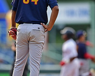 NILES, OHIO - AUGUST 6, 2018: State College Spikes starting pitcher Franyel Casadilla waits for Mahoning Valley Scrappers' Hosea Nelson runs the bases after hitting a solo home run in the second inning of a baseball game, Monday night at Eastwood Field in Niles. DAVID DERMER | THE VINDICATOR
