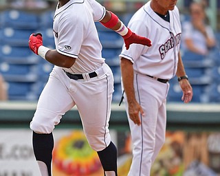 NILES, OHIO - AUGUST 6, 2018: Mahoning Valley Scrappers' Hosea Nelson is congratulated by manger Jim Pankovits after hitting a solo home run off State College Spikes starting pitcher Franyel Casadilla in the second inning of a baseball game, Monday night at Eastwood Field in Niles. DAVID DERMER | THE VINDICATOR