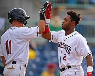 NILES, OHIO - AUGUST 6, 2018: Mahoning Valley Scrappers' Hosea Nelson is congratulated by Clark Scolamiero after hitting a solo home run off State College Spikes starting pitcher Franyel Casadilla in the second inning of a baseball game, Monday night at Eastwood Field in Niles. DAVID DERMER | THE VINDICATOR