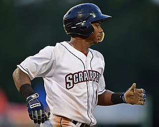 NILES, OHIO - AUGUST 6, 2018: Mahoning Valley Scrappers' Ronny Dominguez singles in the fifth inning of a baseball game against the State College Spikes, Monday night at Eastwood Field in Niles. DAVID DERMER | THE VINDICATOR