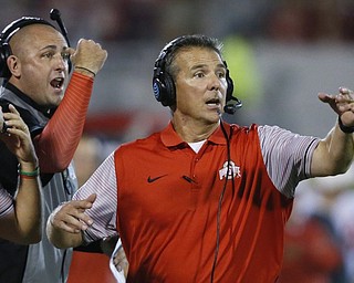 Ohio State will rely on an outside law firm to investigate what coach Urban Meyer knew and did about domestic abuse accusations against a former assistant, a process expected to be completed within two weeks