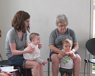 Neighbors | Jessica Harker.Participants danced along with their care givers on July 3 at the Austintown library Baby Brilliant event.
