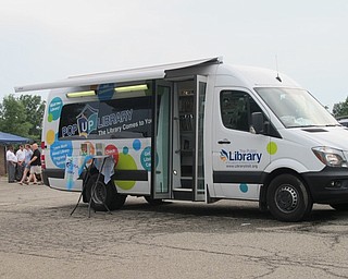 Neighbors | Jessica Harker.The Austintown library set up a Pop Up Library van in the parking lot by Stacey Pavillion at the Austintown Farmers Market on July 2.