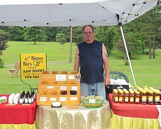 Neighbors | Jessica Harker.Rick Bittner, a bee keeper from Cleveland, sold honey and other honey products from his bee hives on July 2. Bittner said he comes to the market every week because it is one of the best ones in Ohio.