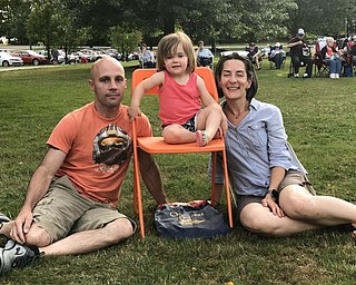 Neighbors | Jessica Harker.Ross, Opal and Amber Kelty sat and listened to the YACCB at Boardman Park on July 26 for the Music in the Park concert series.