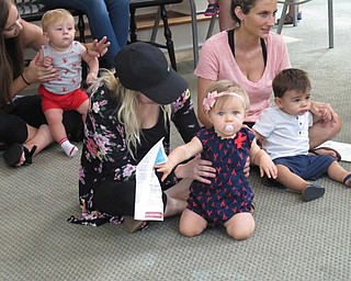 Neighbors | Jessica Harker.Mary Jonston played with her niece, Jacky Mathews, during the Baby Brilliant event at the Poland library July 25.