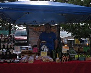 Neighbors | Jessica Harker.Bridget Harker sold homemade items at her stand, Maple Leaf Acres, on July 30 at the weekly Austintown Farmers Market.