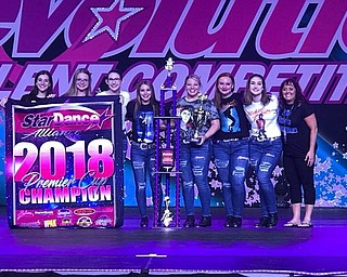 Neighbors | Submitted.Pictured are members of the "P.Y.T." routine, from left, Chloe Simmerman, Jenna Chmelik, Riley Burke, Mackenzie Mackall, Madeline Krasnasky, Maggie Carrier, Molly Burke and Joellen Mrofchak. The group won second overall and earned a spot to re-compete in Revolution’s “Battle of the Champions.” They came from behind to win first place overall, and brought home the prestigious Premier Cup.