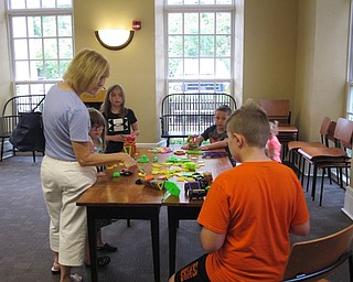 Neighbors | Jessica Harker.Children and their families built with blocks at the third annual Ice Cream Bash on Aug. 2.