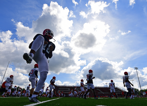 AUSTINTOWN, OHIO - AUGUST 11, 2018: Youngstown State's Jayden Cunningham warms up before the start of the teams practice, Saturday morning at Austintown Fitch High School. DAVID DERMER | THE VINDICATOR
