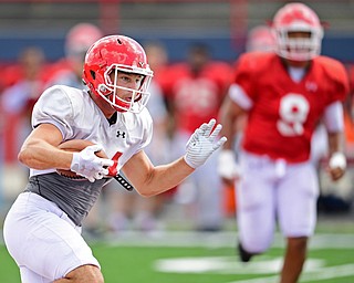 AUSTINTOWN, OHIO - AUGUST 11, 2018: Youngstown State's Zach Torbert runs in the open field during the teams practice, Saturday morning at Austintown Fitch High School. He would score on the play. DAVID DERMER | THE VINDICATOR