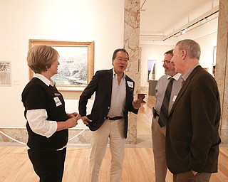  ROBERT K.YOSAY  | THE VINDICATOR..World renown cellist Yo-Yo Ma, and Deborah Rutter, director of the Kennedy Center for Performing Arts arrived at the Butler Institute of American Art this afternoon for a private lunch and discussion on the arts.. With them is Bill Mullane Fine Arts Council of Trumbull County and Lou Zona..-30-