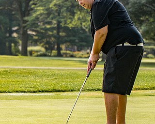 DiANNA OATRIDGE | THE VINDICATOR Abby Cook watches her putt during the Ladies 2-player Championship of the Greatest Golfer of the Valley held at Trumbull Country Club in Warren on Wednesday.