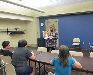Neighbors | Natalie Wright.Boardman librarian Amy Burkard described the process of the Paint by Stickers activity on July 18. Paint by stickers is similar to paint by numbers, but without using any paints.