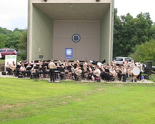 Neighbors | Jessica Harker.Director Joe Pellergrini led the Youngstown Area Community Concert Band on June 24 at the Austintown Park.