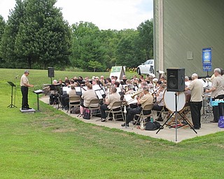 Neighbors | Jessica Harker.The Youngstwon Area Community Concert Band preforms July 24 at the Austintown Park.