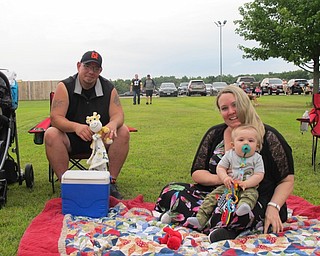 Neighbors | Jessica Harker.Todd and Marian Blessing, along with their 9-month-old son T.J., sat and watched the Youngstown Area Community Concert Band preform June 24 at the Austintown Park.