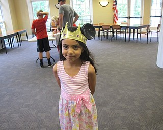 Neighbors | Natalie Wright.Nourssin Elshalabi and her brother, Yassin (not pictured) attended the Shimmy, Shake and Make event at the Poland library on July 23. Nourssin said that her favorite craft at the event was the teddy bear ear bud holder.