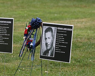  ROBERT K.YOSAY  | THE VINDICATOR..The Healing Wall - dedication - at  Packard Park..Tim Ryan ..Memorials for each of the 60 Trumbull County Residents are in front of the wall.-30-