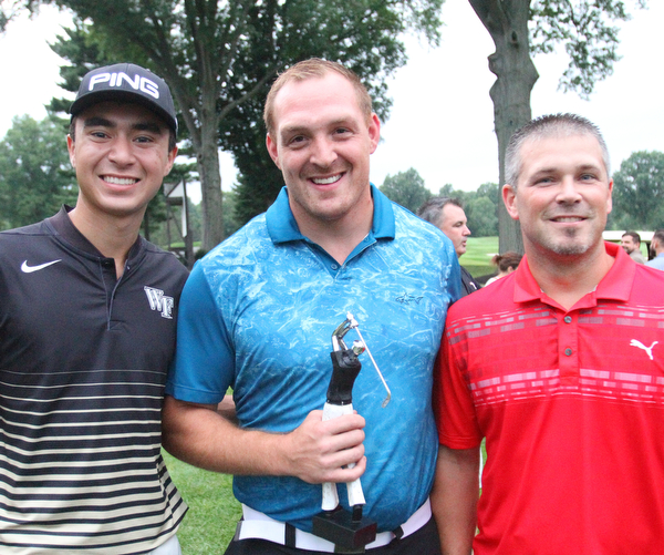 William D. Lewis The Vindicator GGOV long drive winner Ryan Monahan, center is flanked by Jared Wilson, 3rd place, left and Scott Hoff, 2nd place.