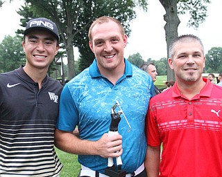 William D. Lewis The Vindicator GGOV long drive winner Ryan Monahan, center is flanked by Jared Wilson, 3rd place, left and Scott Hoff, 2nd place.