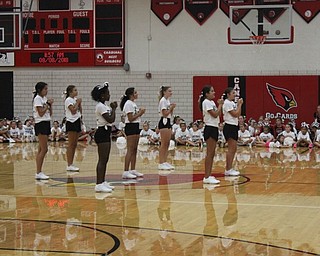 Neighbors | Abby Slanker.The group of eighth-grade attendees of the Canfield High School cheerleaders’ annual Kiddie Cheer Camp performed a cheer at the parent demonstration.