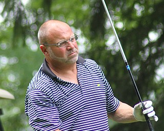 William D. Lewis The Vindicator Will Heid watches his t shot during GGOV at Mill creek 8-17-18.