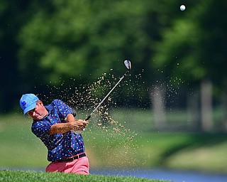 HOWLAND, OHIO - AUGUST 18, 2018: Monte Duncan watches his shot from the bunker on the ninth hole, Saturday afternoon during the Vindy Greatest Golfer at Avalon Lakes. DAVID DERMER | THE VINDICATOR