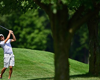 HOWLAND, OHIO - AUGUST 18, 2018: Mike McClure of Struthers watches his approach shot on the ninth hole, Saturday afternoon during the Vindy Greatest Golfer at Avalon Lakes. DAVID DERMER | THE VINDICATOR