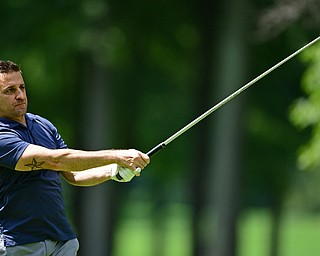 HOWLAND, OHIO - AUGUST 18, 2018: Jim Gaca of Canfield watches his tee shot on the seventh hole, Saturday afternoon during the Vindy Greatest Golfer at Avalon Lakes. DAVID DERMER | THE VINDICATOR