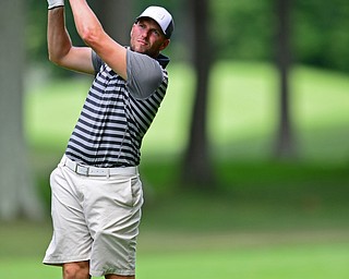 HOWLAND, OHIO - AUGUST 18, 2018: James Schuler of New Middleton watches his approach shot on the sixth hole, Saturday afternoon during the Vindy Greatest Golfer at Avalon Lakes. DAVID DERMER | THE VINDICATOR