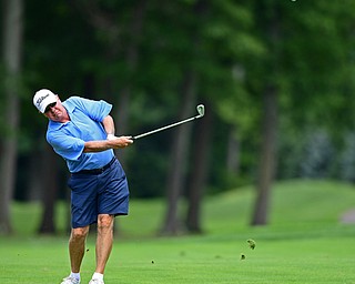 HOWLAND, OHIO - AUGUST 18, 2018: John Mayo of Boardman watches his approach shot on the fifth hole, Saturday afternoon during the Vindy Greatest Golfer at Avalon Lakes. DAVID DERMER | THE VINDICATOR