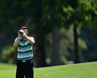 HOWLAND, OHIO - AUGUST 18, 2018: Dan Diloreto of Struthers uses a range finder on the 12th hole, Saturday afternoon during the Vindy Greatest Golfer at Avalon Lakes. DAVID DERMER | THE VINDICATOR